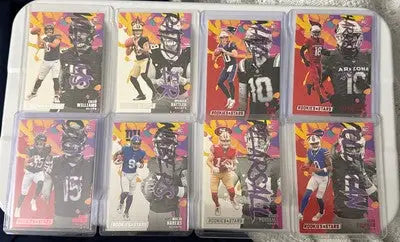 2024 Rookies And Stars Football Lot with trading cards in protective cases featuring stars football players