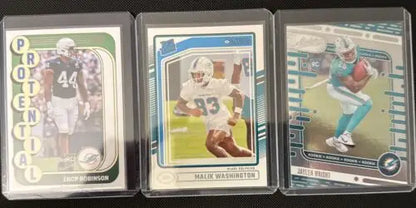 Three football trading cards featuring Rookies Jaylen Wright, Chop Robinson, and Malik Washington