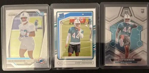 Three football trading cards featuring Rookies Jaylen Wright, Chop Robinson, and Malik Washington