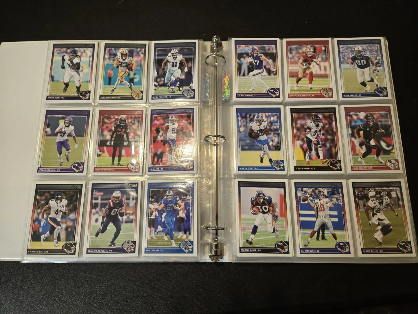 Score Football binder filled with 250+ football trading cards featuring stars and legends