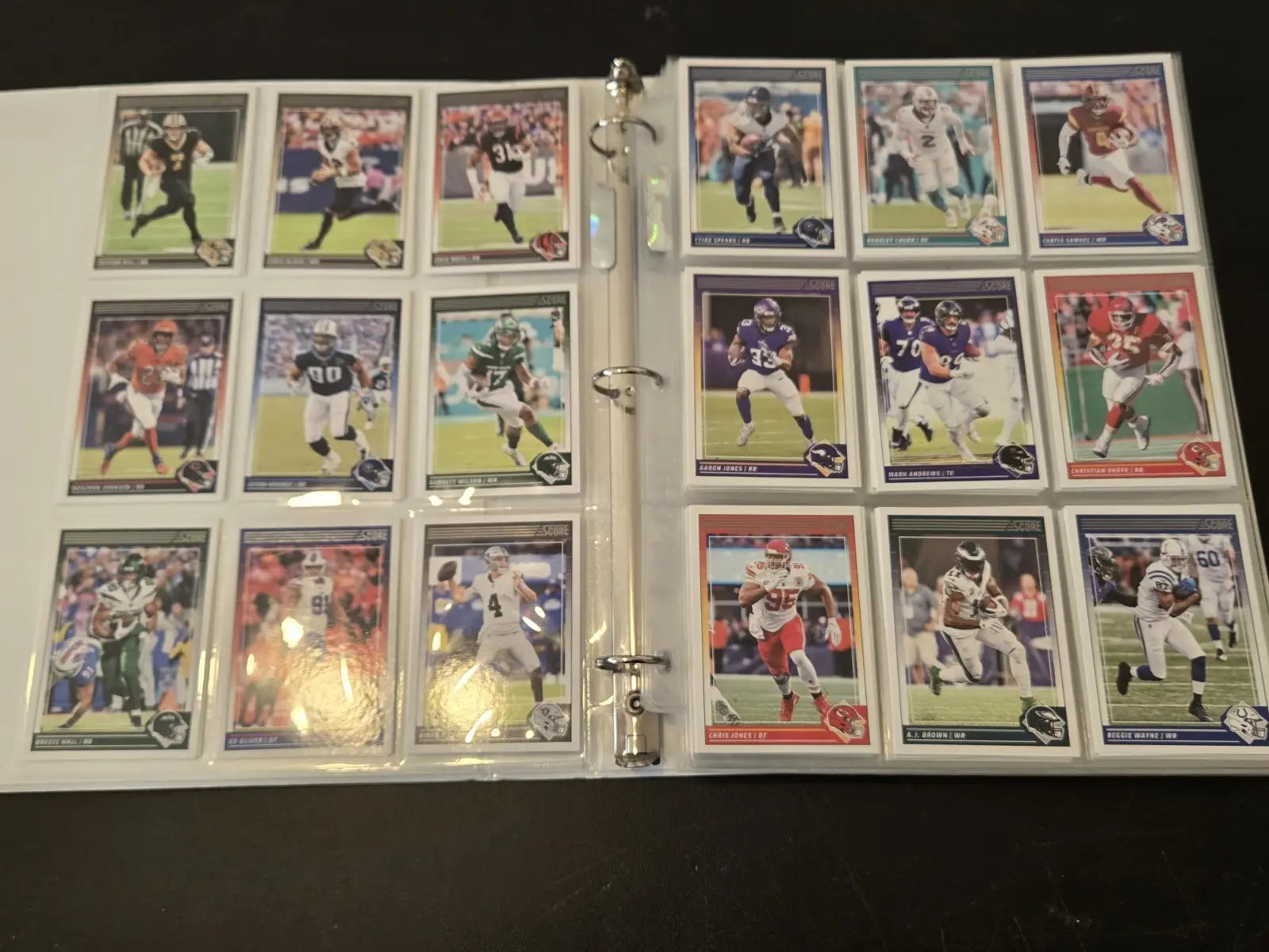 Score Football binder filled with 250+ football trading cards featuring stars and legends