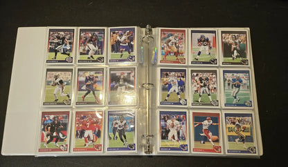 Score Football binder filled with 250+ football trading cards featuring stars and legends