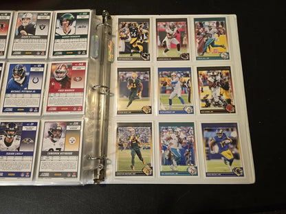 Score Football binder with 250+ trading cards featuring stars and legends in a 1-inch album