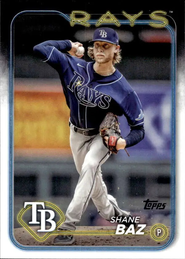 Baseball card of Shane Baz pitching in a navy blue Tampa Bay Rays uniform