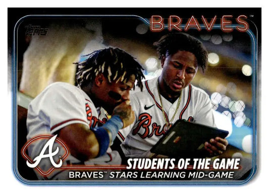 Baseball card featuring Atlanta Braves players Ronald Acuna Jr. using a tablet