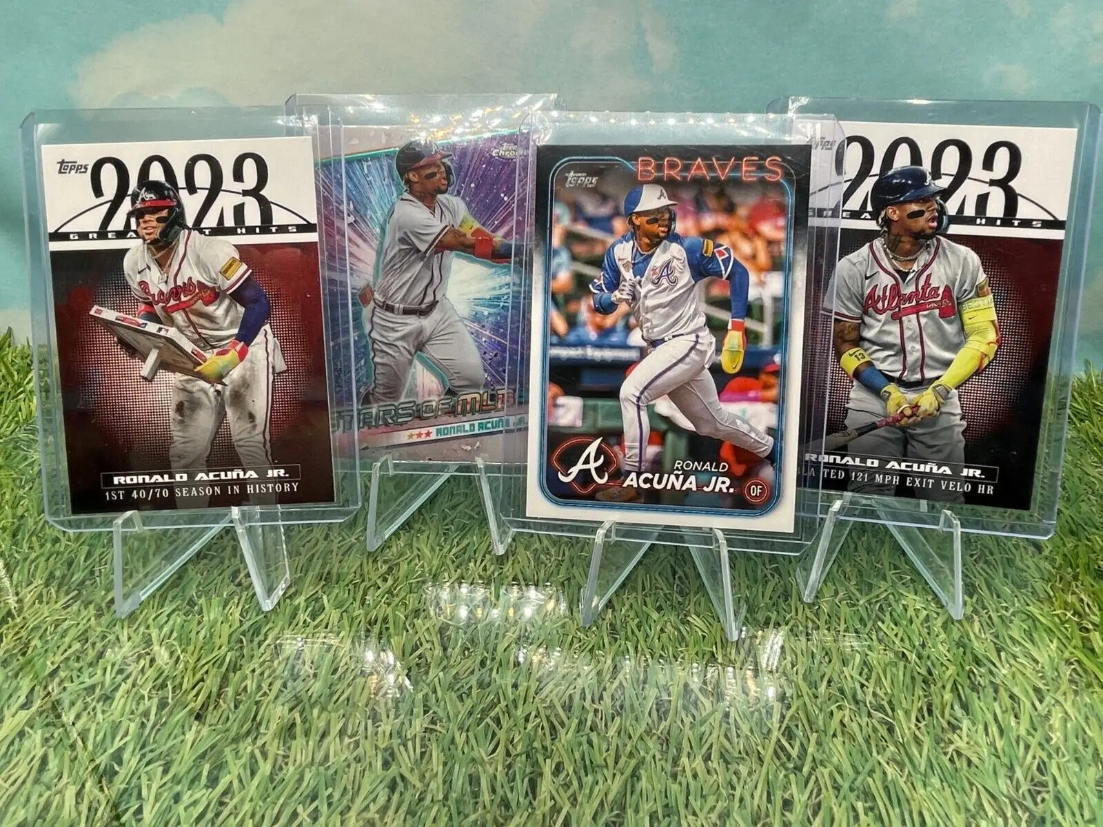 Four Topps Baseball Series Ronald Acuña Jr. cards featuring Atlanta Braves players