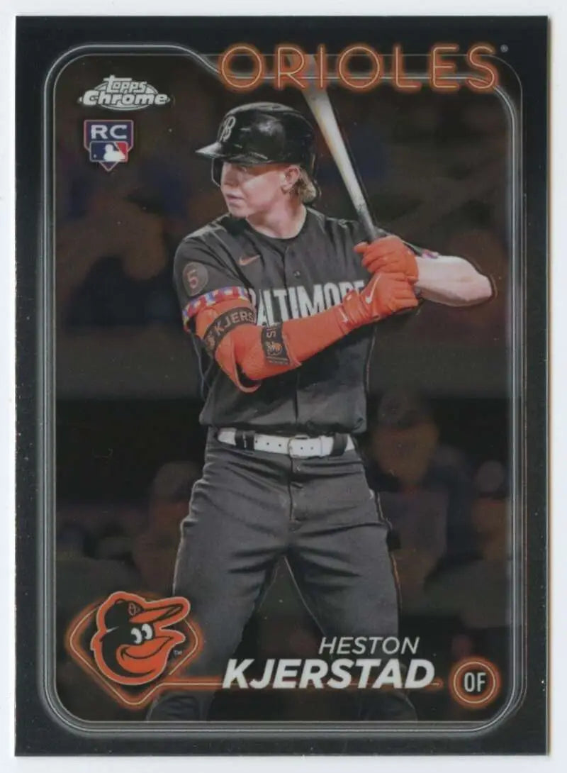 Baseball card of Heston Kjerstad in black Baltimore Orioles uniform with orange accents