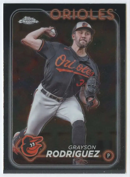 Baseball card of Grayson Rodriguez, Baltimore Orioles pitcher in black jersey mid-throw