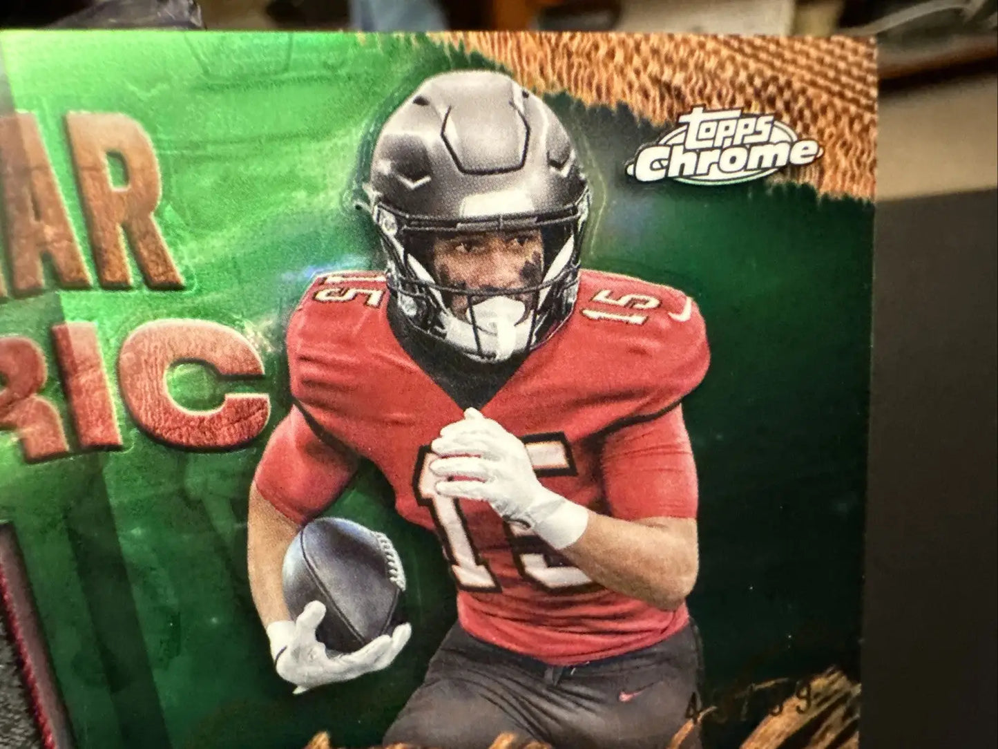 Football trading card featuring Jalen McMillan in a red jersey and black helmet from Topps Chrome 2024 Year Fabric series