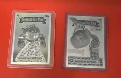 Collectible Garbage Pail Kids trading cards in protective cases from 2024 Topps Chrome