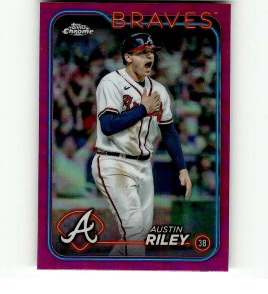 Pink-bordered Topps Chrome Refractor of Austin Riley celebrating for Atlanta Braves