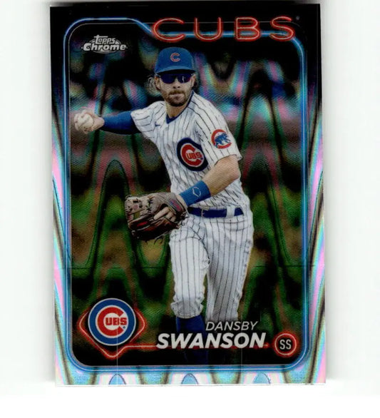 Baseball card of Dansby Swanson in Chicago Cubs white pinstriped uniform Topps Chrome Refractor RayWave