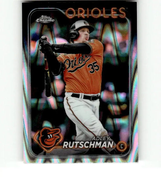 Baltimore Orioles Adley Rutschman swinging bat on 2024 Topps Chrome baseball card