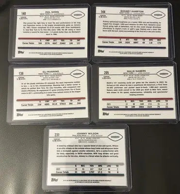 Five Topps Chrome Sepia Refractor Football Cards in protective sleeves for sale