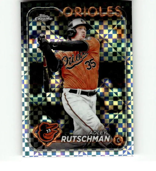 Adley Rutschman swinging bat in orange jersey on 2024 Topps Chrome X-Fractor card