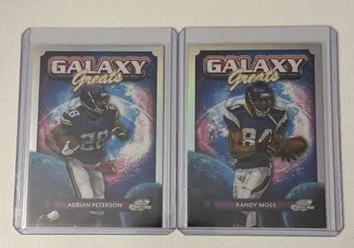 2024 Topps Cosmic Chrome Adrian Peterson and Randy Moss Vikings Galaxy Greats trading cards in protective cases