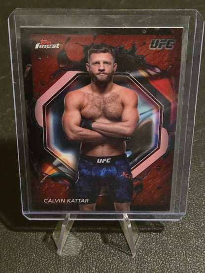UFC Calvin Kattar trading card in protective case from 2024 Topps Finest UFC Calvin Kattar Red Shimmer Refractors