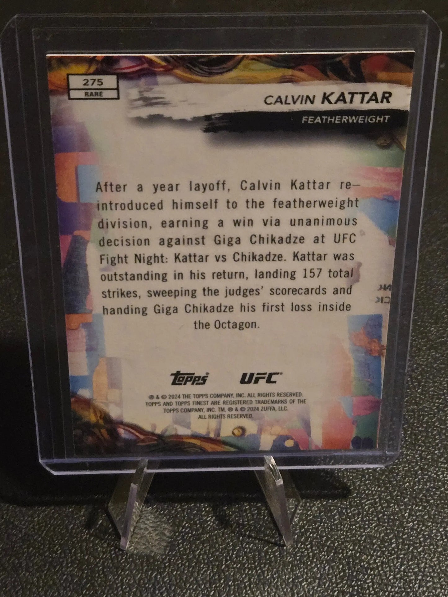 Rare Calvin Kattar UFC trading card in protective case from 2024 Topps Finest UFC series featuring Calvin Kattar Red Shimmer Refractors