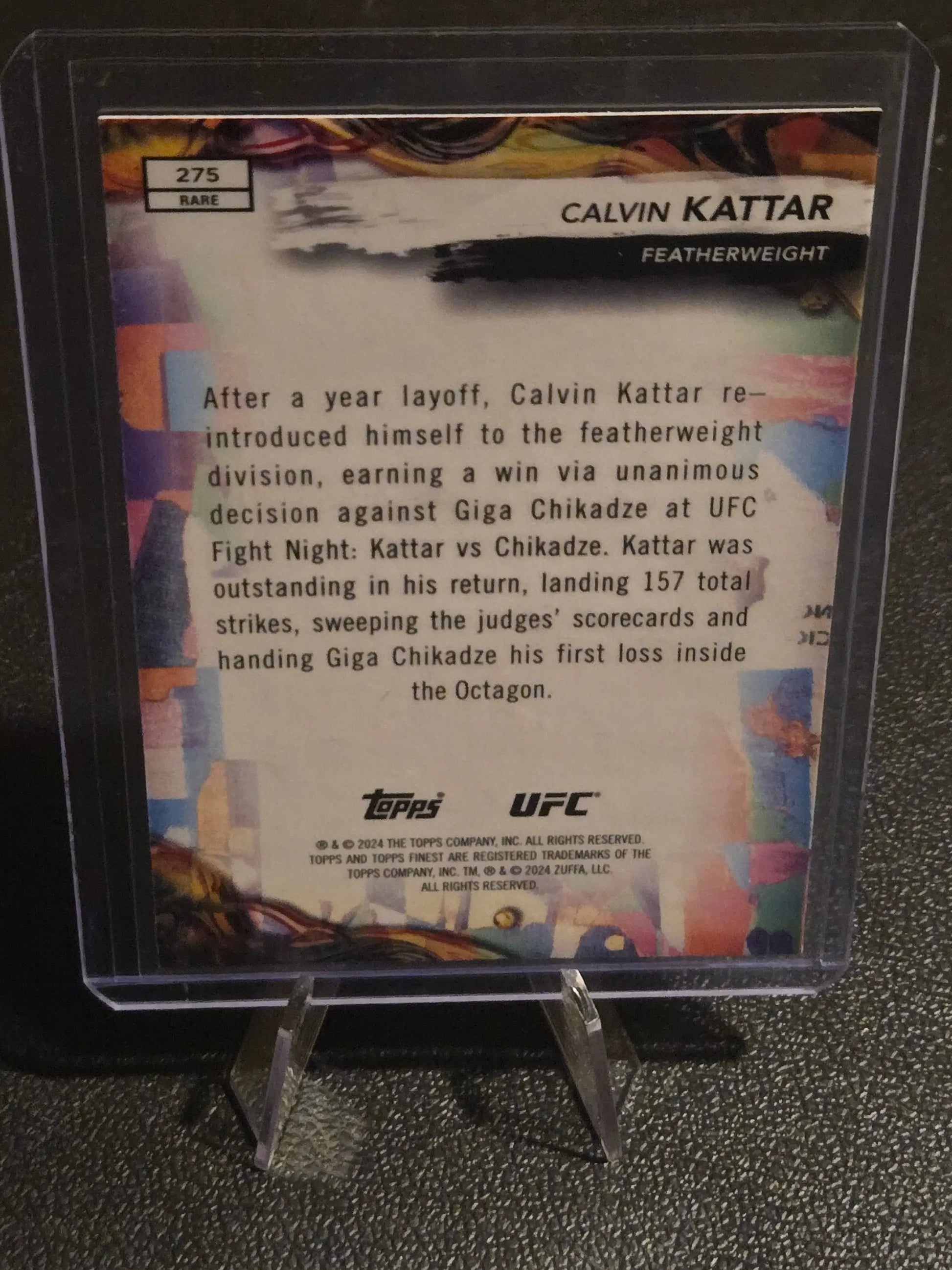 Rare Calvin Kattar UFC trading card in protective case from 2024 Topps Finest UFC series featuring Calvin Kattar Red Shimmer Refractors