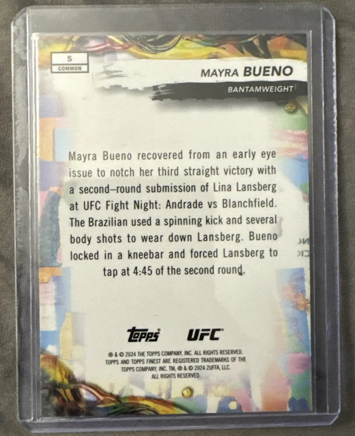 Mayra Bueno UFC trading card in protective sleeve from 2024 Topps Finest UFC collection