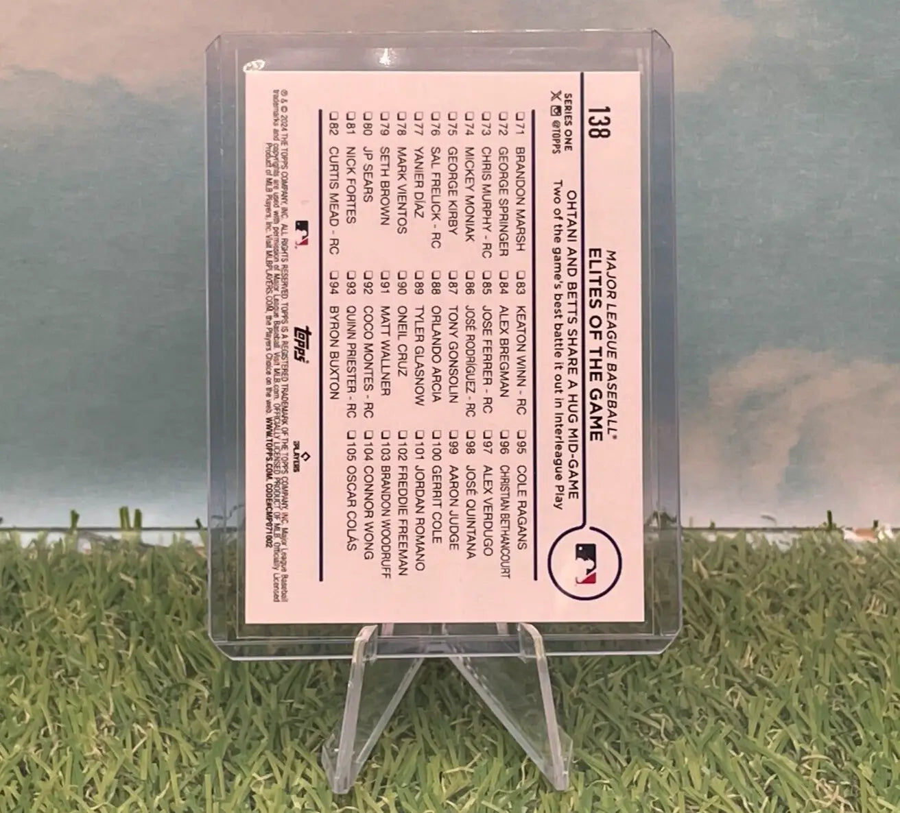 Baseball card in protective case featuring Shohei Ohtani and Mookie Betts from Topps Series 1