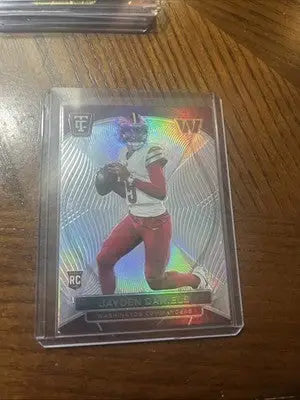 Football trading card featuring Jayden Daniels in white and maroon uniform from 2024 Totally Certified series