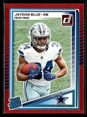 Jaydon Blue rookie football card in Dallas Cowboys uniform from 2025 Donruss Rated Rookies Press Proof Red