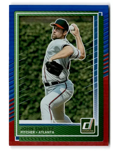 Original gloss Donruss Red baseball card of John Smoltz pitching for Atlanta