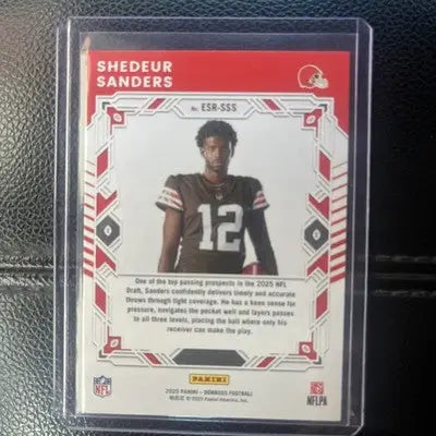 Shedeur Sanders 2025 Donruss Elite Series rookie card in protective sleeve Cleveland Browns
