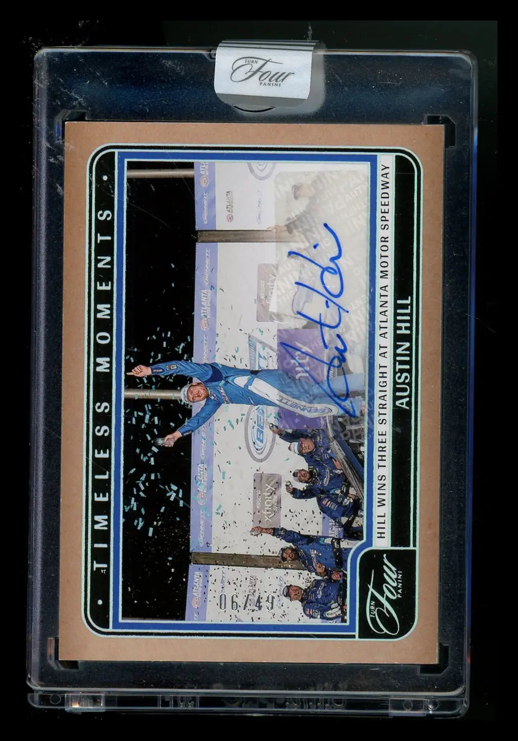 Austin Hill autographed racing card in protective case from Panini Turn Four Timeless Moments