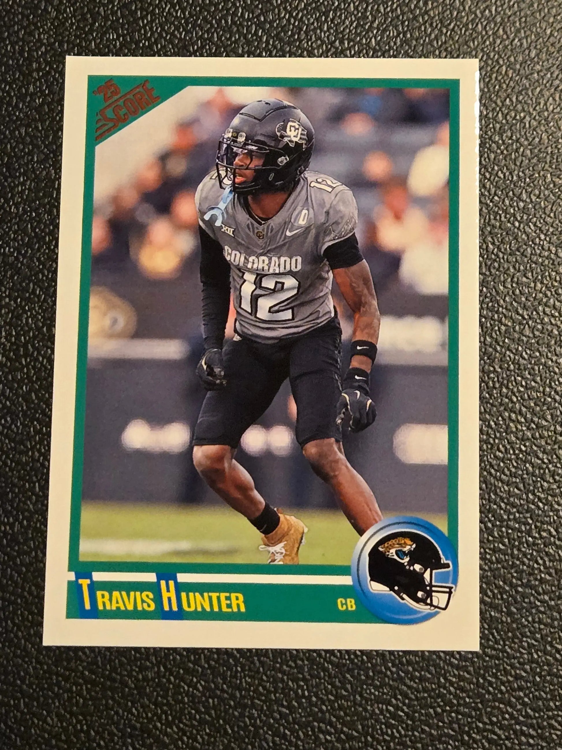 Football trading card featuring Travis Hunter in Colorado Buffaloes uniform from 2025 Score Hunter Anniversary Rookies series
