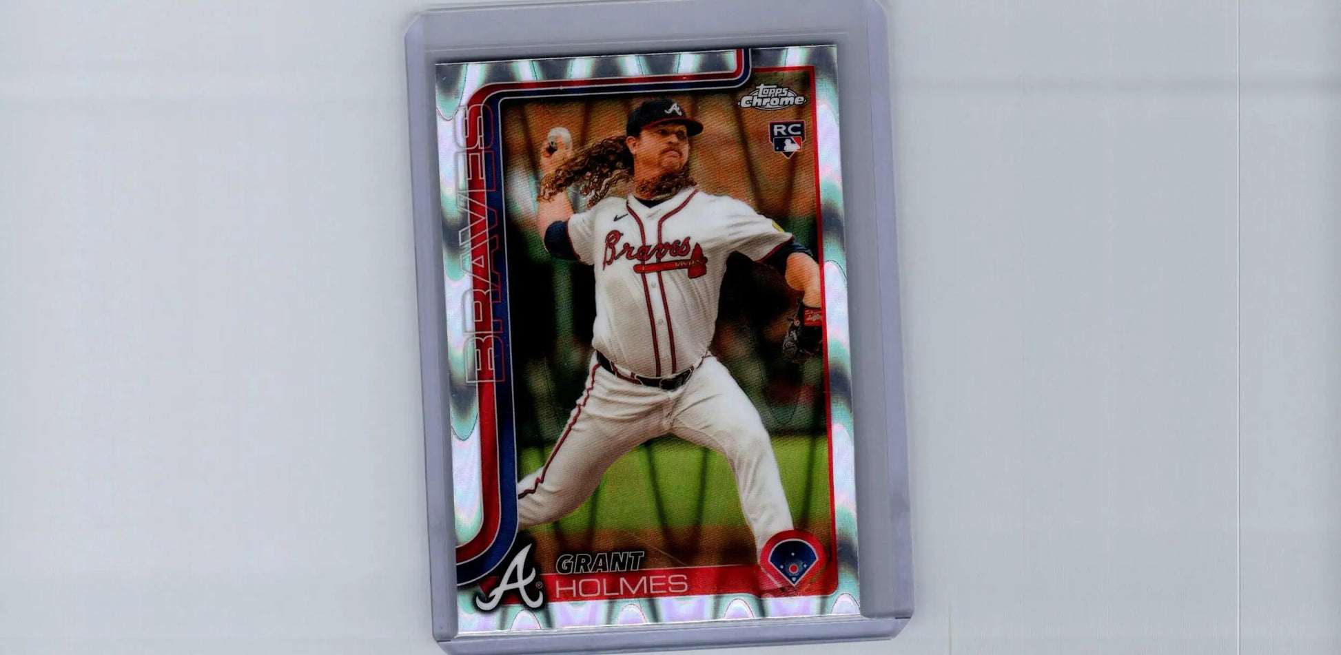 Collectible Grant Holmes Raywave Refractors baseball card in protective case featuring Holmes in Braves uniform