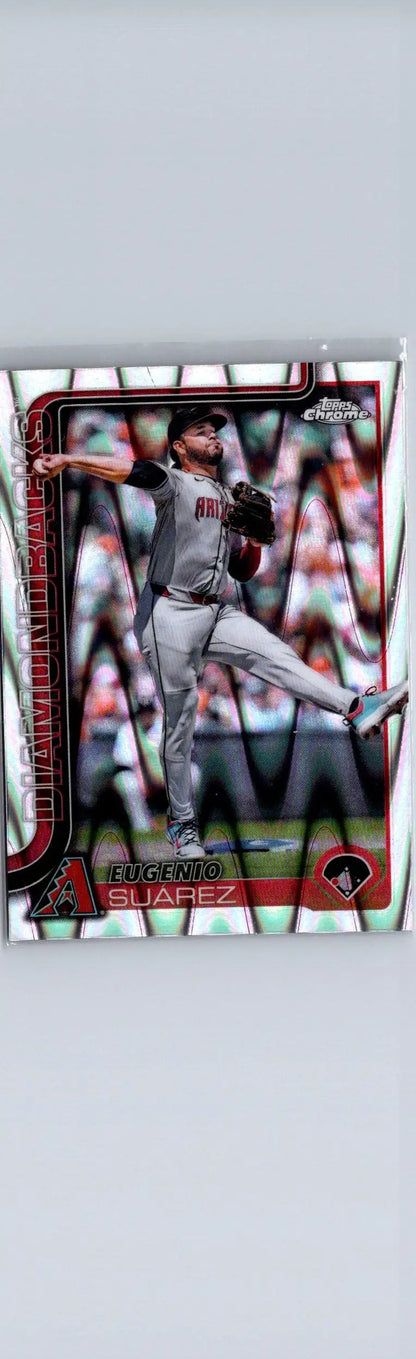 Baseball trading card featuring Eugenio Suárez in mid-pitch from 2025 Topps Chrome Raywave Refractors