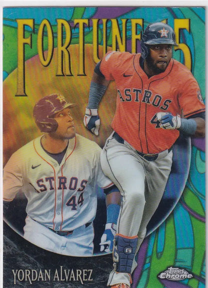 2025 Topps Chrome Fortune Yordan Alvarez baseball card with two Houston Astros uniforms