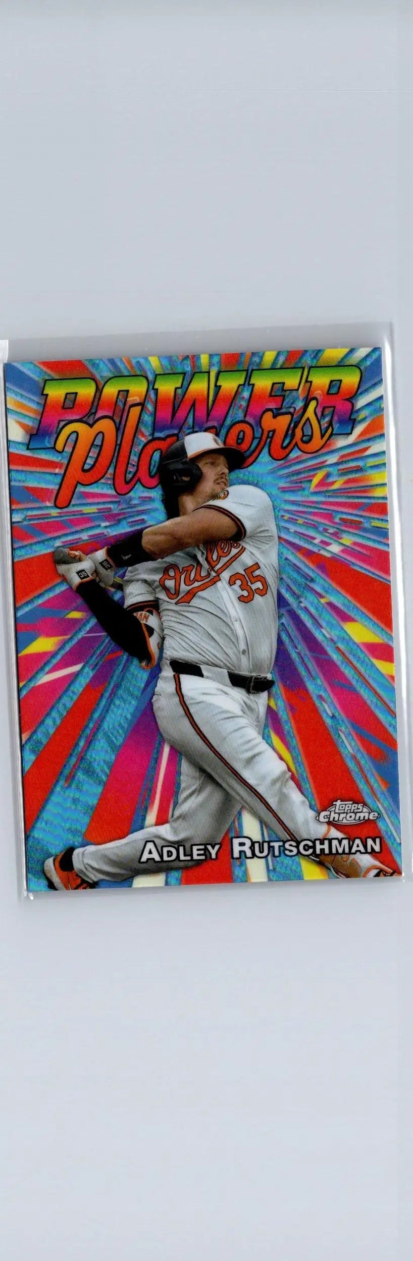 2025 Topps Chrome Adley Rutschman Power Players trading card with vibrant starburst background