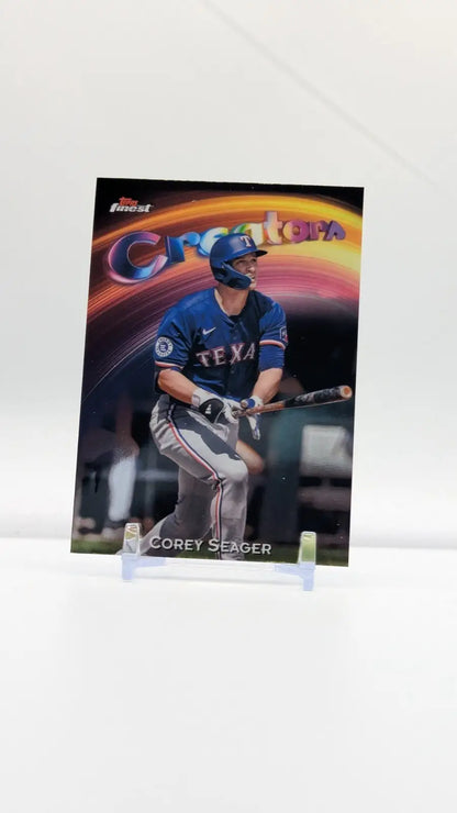 Baseball trading card of Corey Seager in Texas Rangers uniform with penny sleeve protection