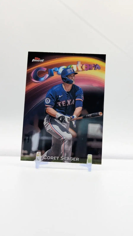 Baseball trading card of Corey Seager in Texas Rangers uniform with penny sleeve protection