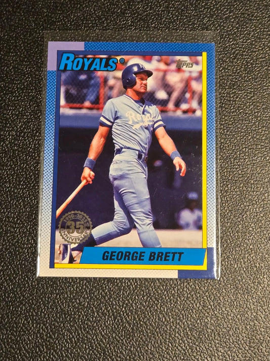 Collectible Topps George Brett baseball card in protective sleeve for 35th anniversary celebration