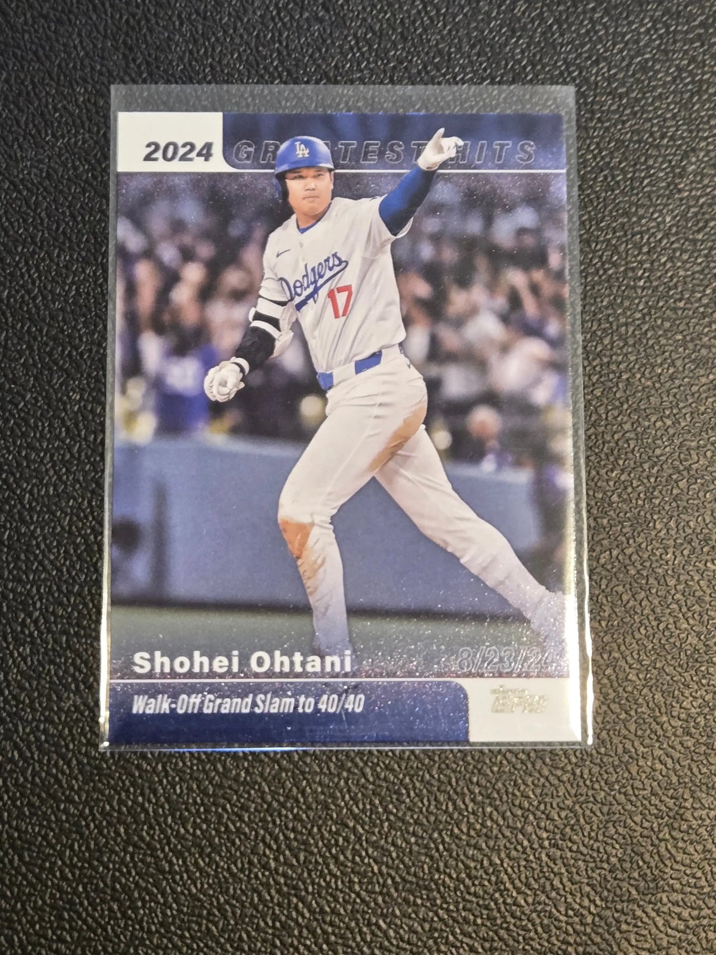 2024 Shohei Ohtani baseball card in protective sleeve from 2025 Topps Greatest Hits series
