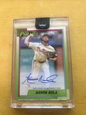 Topps Series 1 Aaron Nola baseball trading card with autograph in protective case