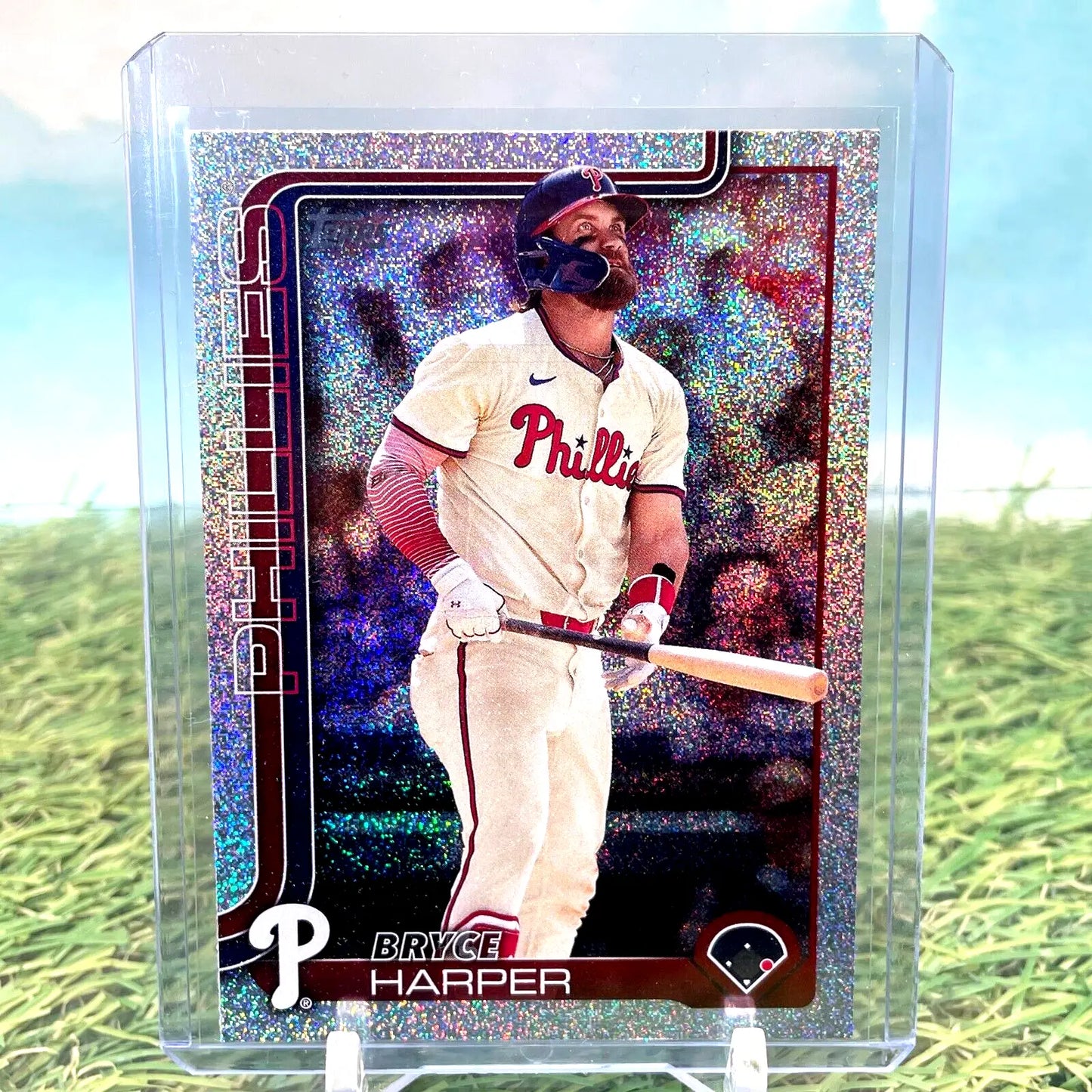 Bryce Harper baseball card from 2025 Topps Series 1 Sandglitter Rainbow Foil #250