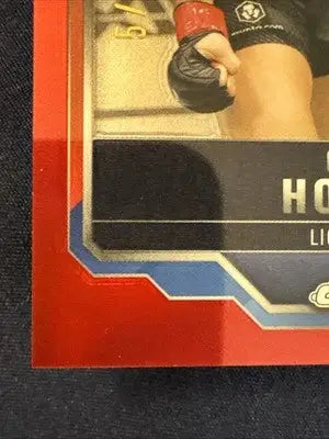 Partial view of a Topps UFC Chrome Chase Hooper Red & Blue Refractor card