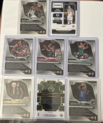 Basketball trading card lot featuring WNBA All-Star players in protective sleeves
