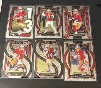 Six football trading cards from the 49ers 2024 Select Football card lot featuring players like Purdy and Montana