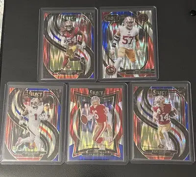 Collection of seven NFL trading cards in protective cases from 49ers 2024 Select Football card lot