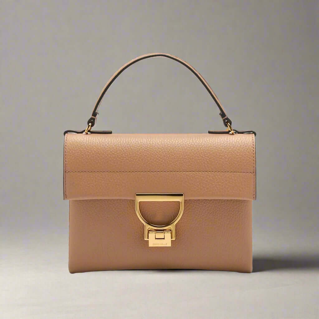 Coccinelle women's brown leather Handbags