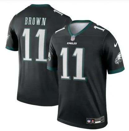 Two black Philadelphia Eagles Nike Legend jerseys with green trim, number 11, front and back featuring BROWN