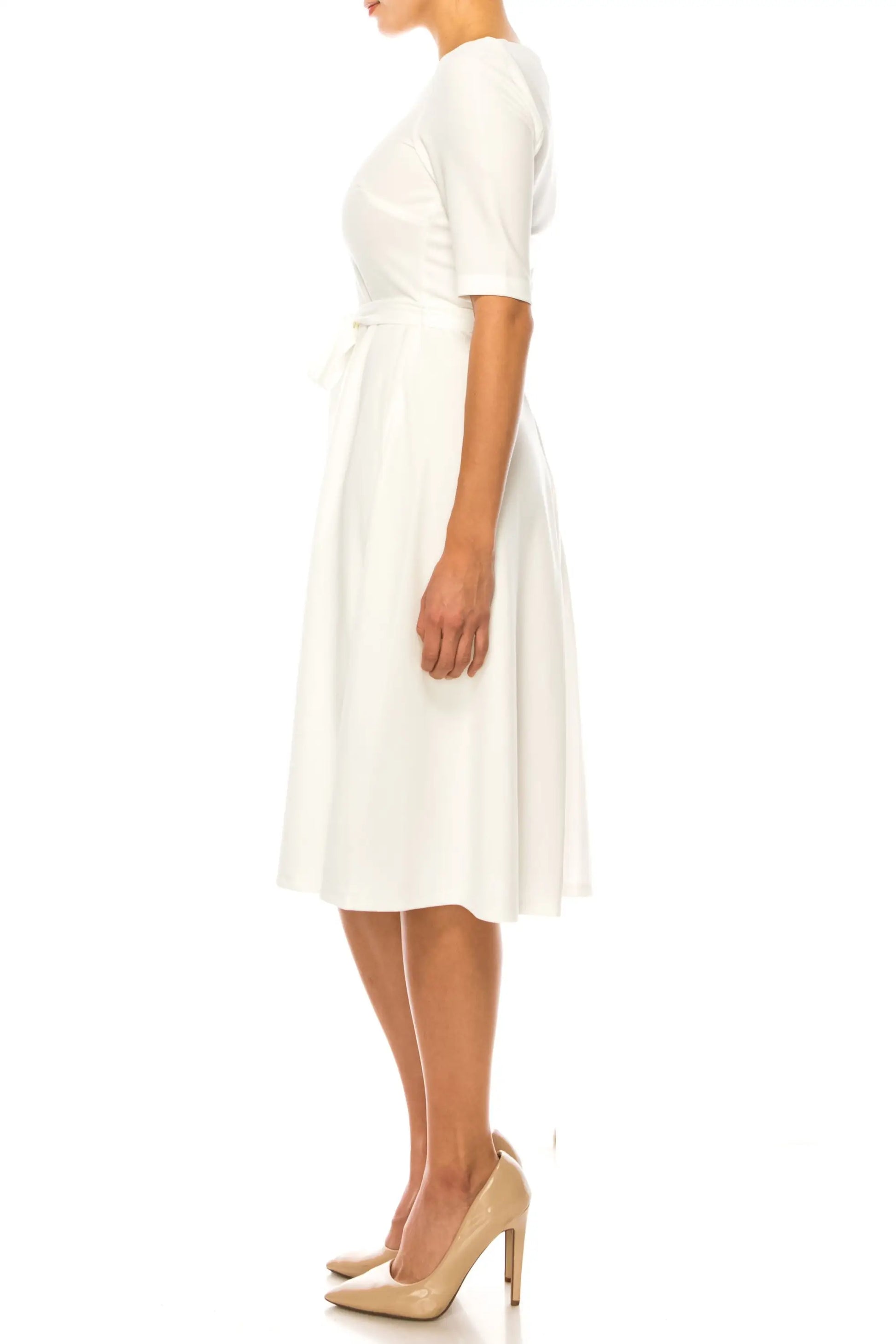 Maison Tara day dress in azure blue with cinched waist and pleated midi skirt