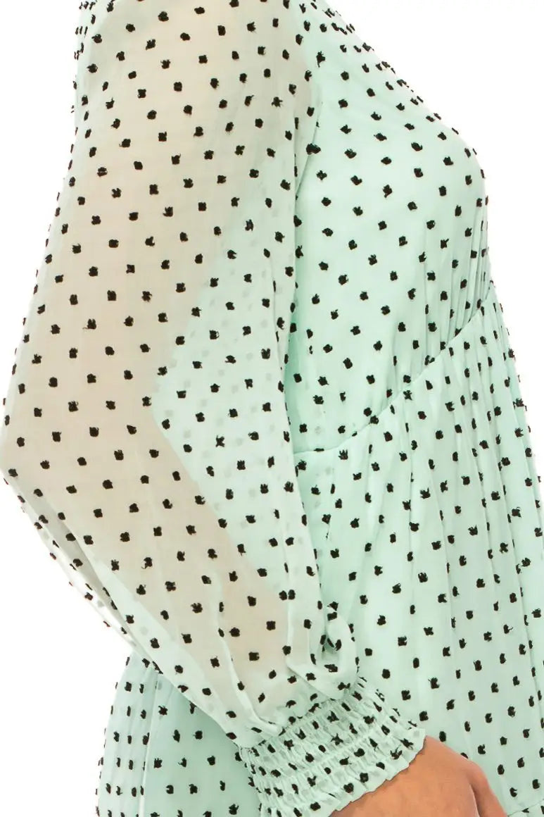 Mint green polka dot long-sleeve dress with elasticized cuffs by Maison Tara