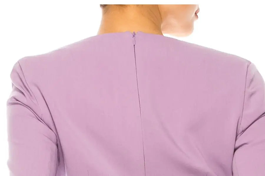 Nicole Miller Rhapsody illusion long-sleeved top shown from the back with zipper closure